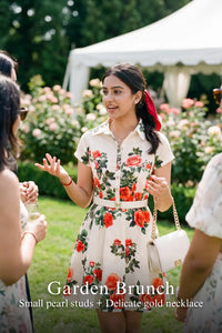 Woman in Pretty Pixie ivory rose print belted shirt mini dress styled for a garden brunch