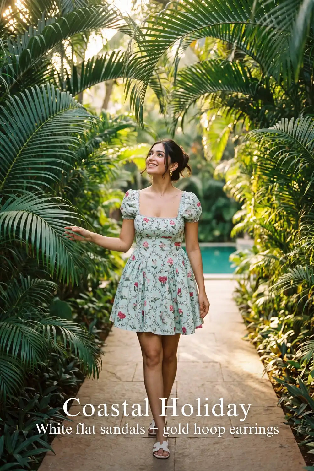 Pretty Pixie mint puff-sleeve floral mini dress for coastal holiday.