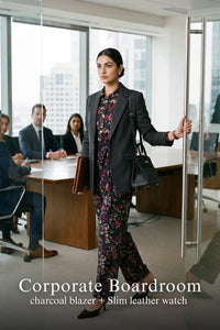 Woman in Pretty Pixie navy floral belted shirt & wide-leg co-ord set styled for a corporate boardroom