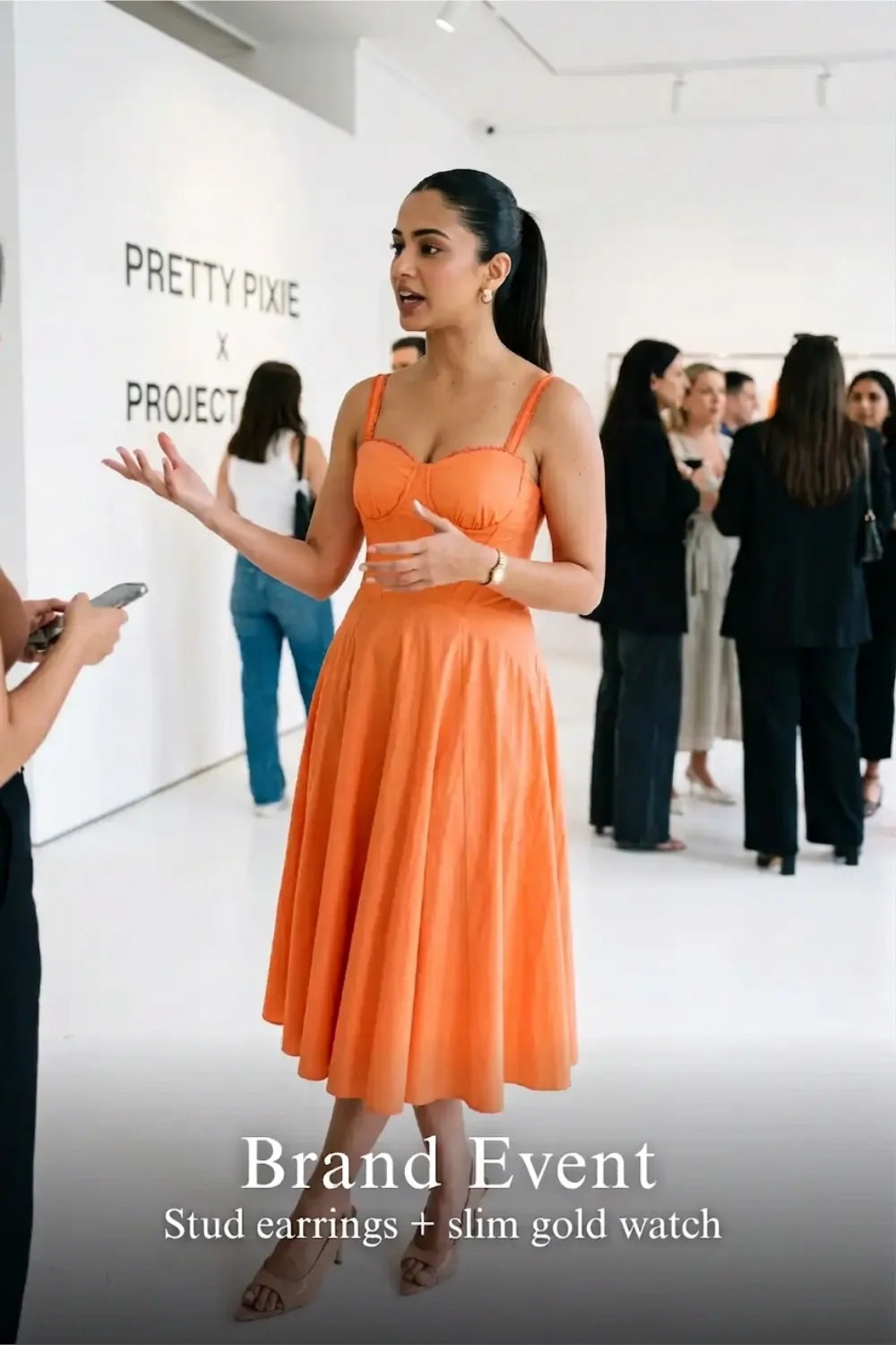 Pretty Pixie coral orange spaghetti strap bustier cotton dress for brand event.