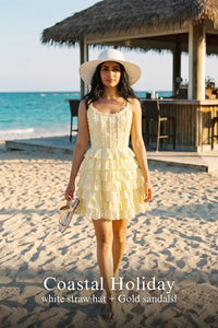 Pretty Pixie buttercream yellow eyelet tiered ruffle dress for coastal holiday.
