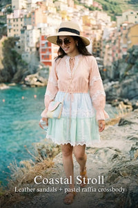 Pretty Pixie pastel peach lace-trim tiered mini dress for coastal stroll.