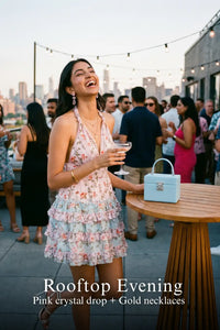 Pretty Pixie pastel pink floral halter mini dress for rooftop evening.