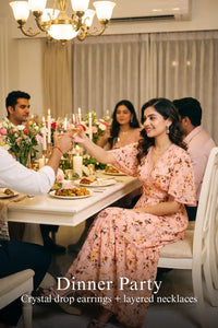 Woman in Pretty Pixie peach floral ruffle maxi dress styled for a dinner party 2