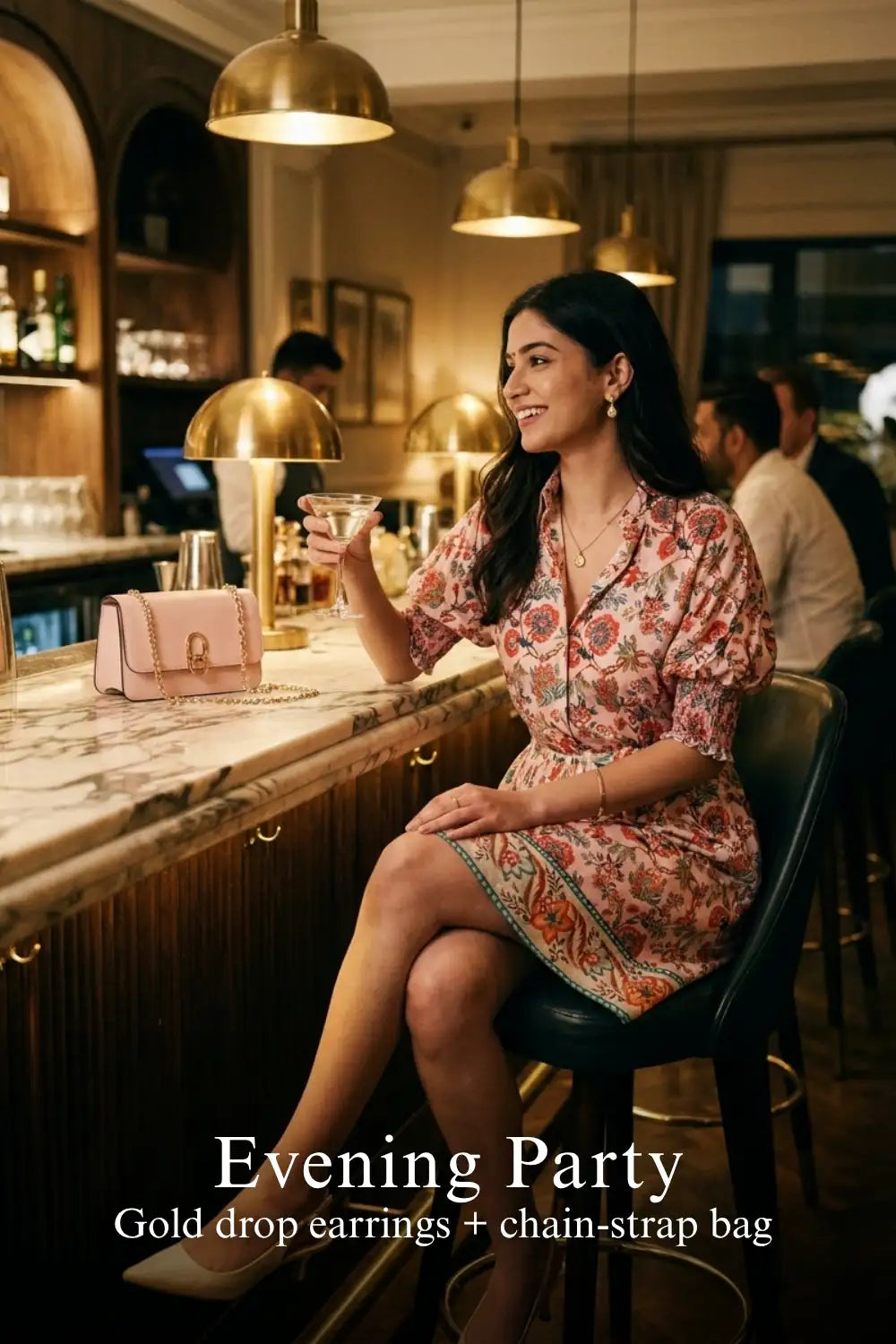 Woman in Pretty Pixie pink floral puff-sleeve belted mini dress styled for an evening party