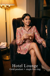 Pretty Pixie pink floral jacquard ruffle belted mini dress for hotel lounge.