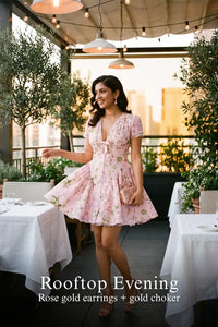 Pretty Pixie pink floral tie-neck cap-sleeve mini dress for outdoor terrace.