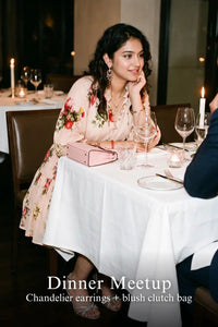 Woman in Pretty Pixie blush floral belted puff-sleeve mini dress styled for a dinner meetup