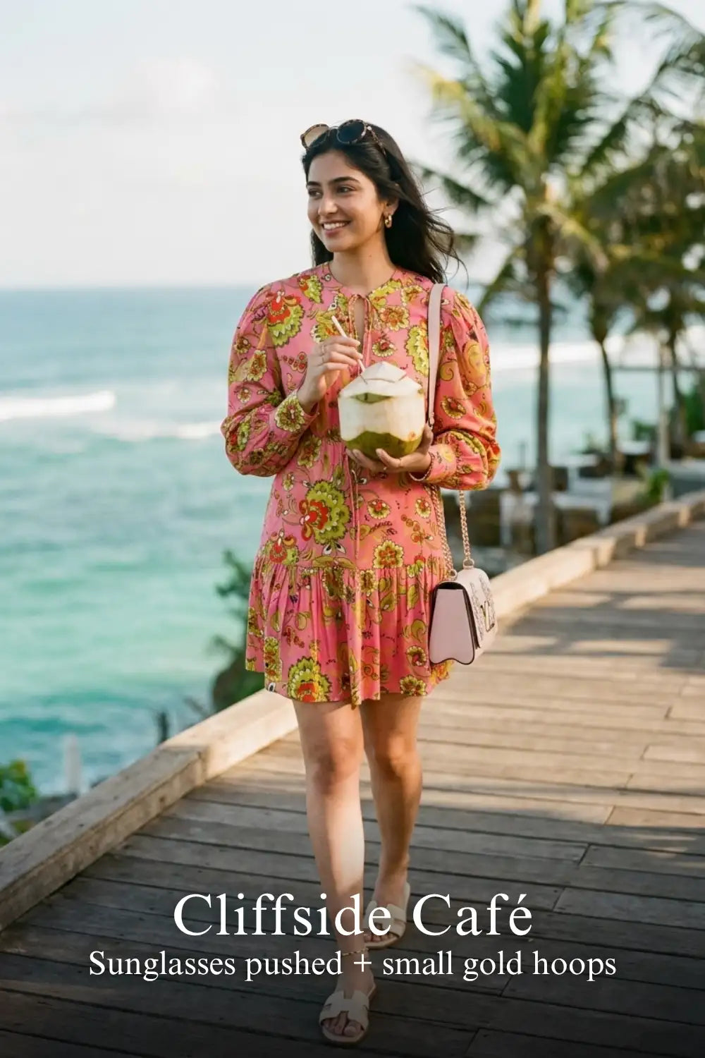 Pretty Pixie paradise pink floral puff-sleeve belted mini dress styled for a cliffside cafe