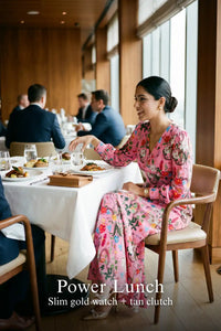 Woman in Pretty Pixie pink floral v-neck long-sleeve maxi dress styled for a power lunch