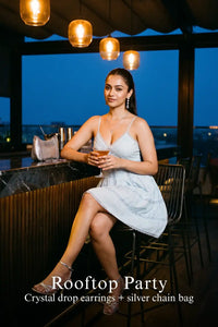 Pretty Pixie powder blue lace-trim spaghetti strap mini dress for rooftop party.