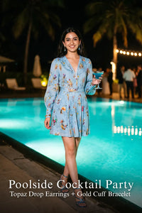 Pretty Pixie sky-blue floral mini dress for poolside cocktail party.