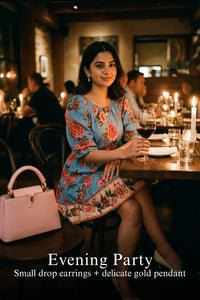 Pretty Pixie blue floral puff-sleeve belted mini dress styled for an evening party
