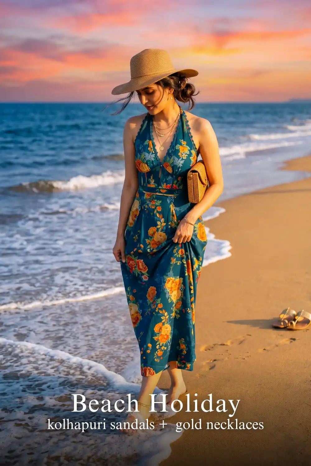 Woman in Pretty Pixie sunset crush royal indigo floral halter maxi dress styled for a beach holiday