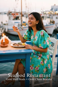 Pretty Pixie teal floral puff-sleeve mini dress for seafood restaurant.