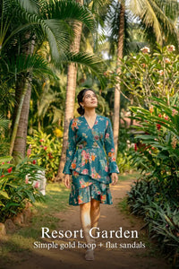 Pretty Pixie emerald floral wrap belted ruffle-hem mini dress for resort garden.