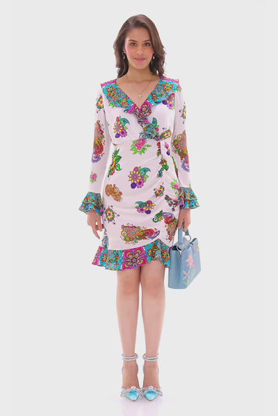 White floral wrap mini dress with long sleeves and ruffle hem