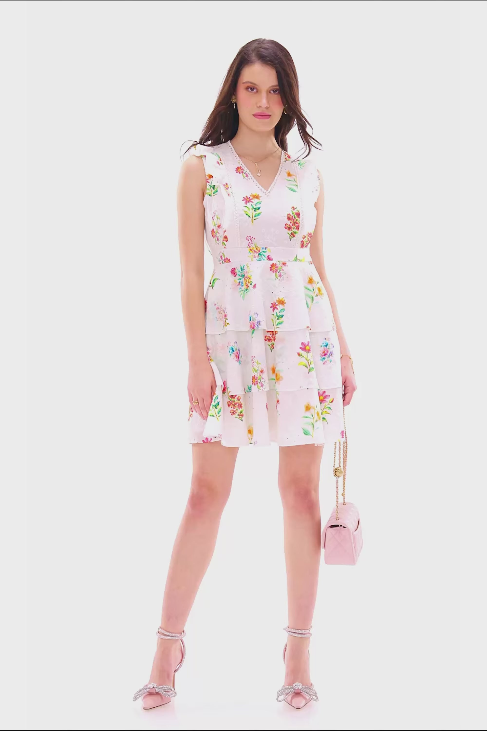 White floral sleeveless mini dress with layered ruffles