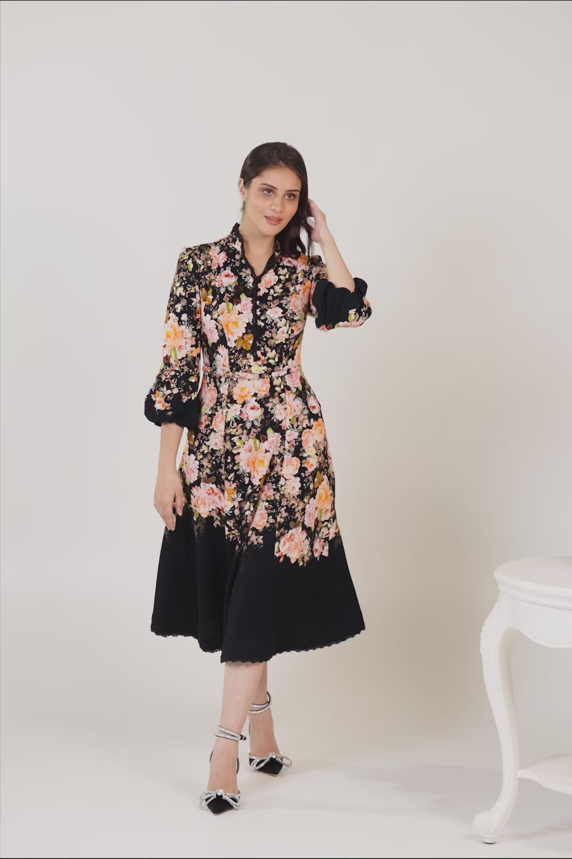 Elegant black floral midi dress with long sleeves