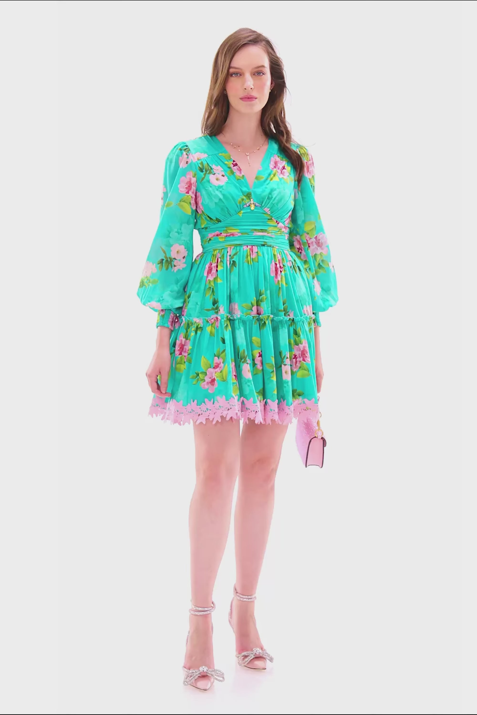 turquoise floral lace mini dress with long sleeves and pink lace hem