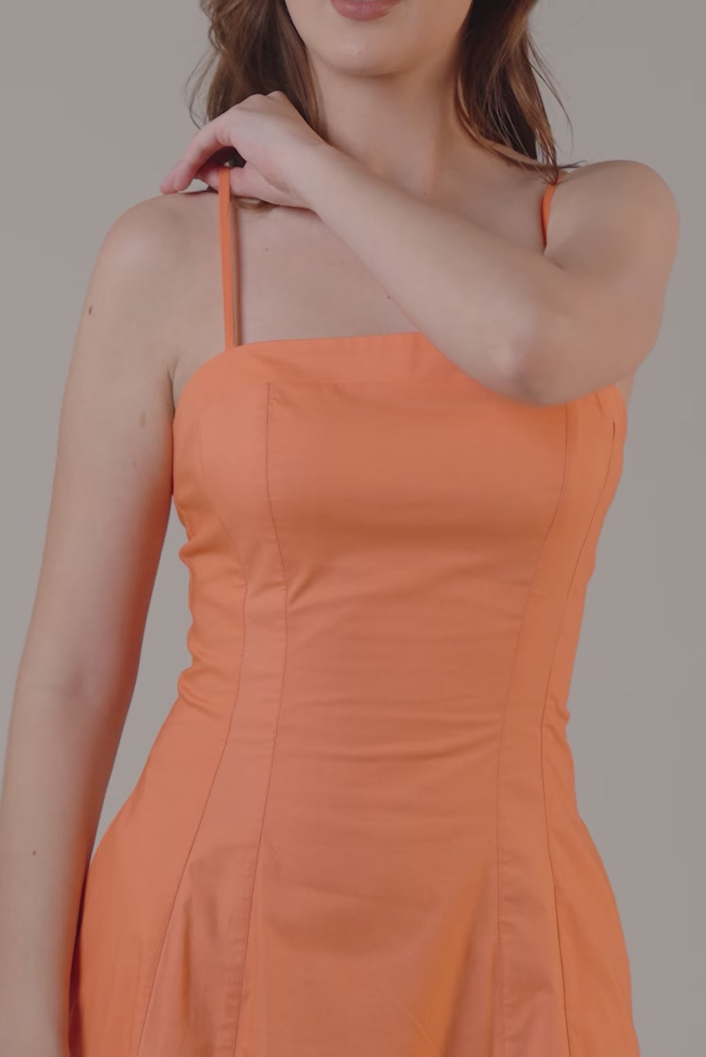 orange spaghetti strap midi dress with straight neckline