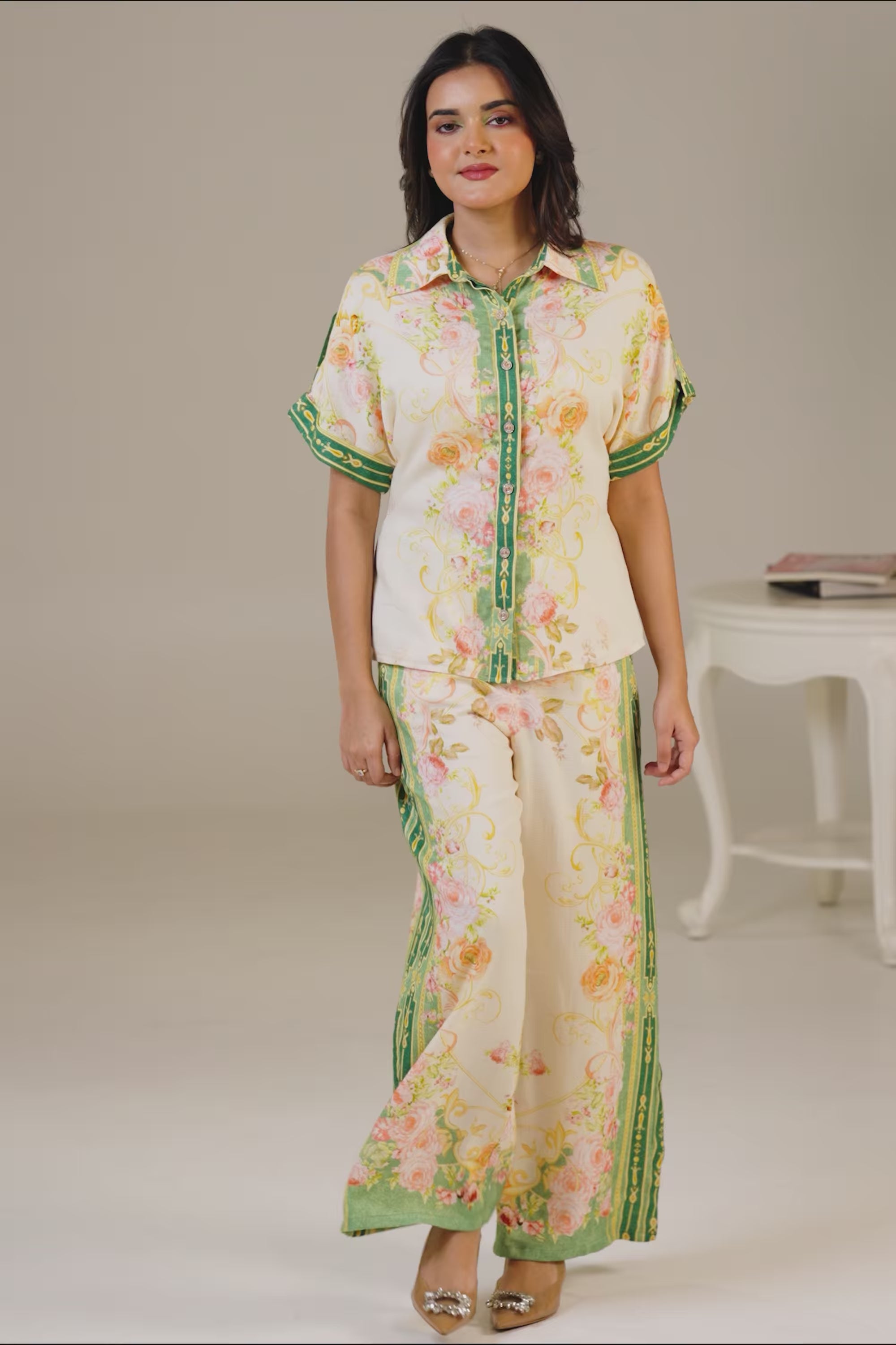 Woman wearing floral green border co-ord set