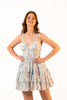 Women wearing blue floral tiered mini dress with lace straps and fitted bodice