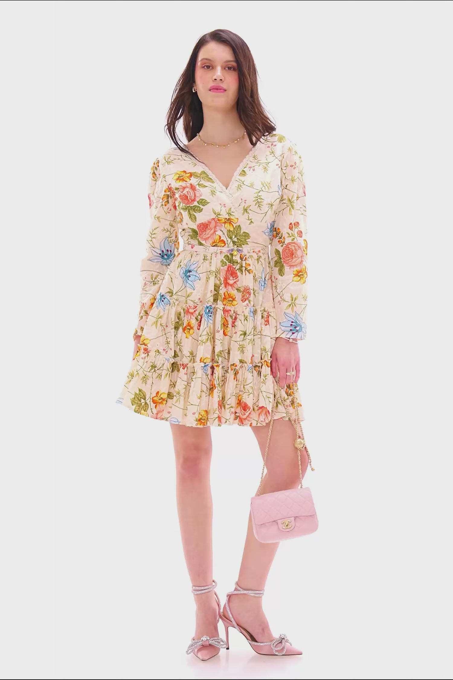 Cream floral V-neck tiered mini dress with long sleeves