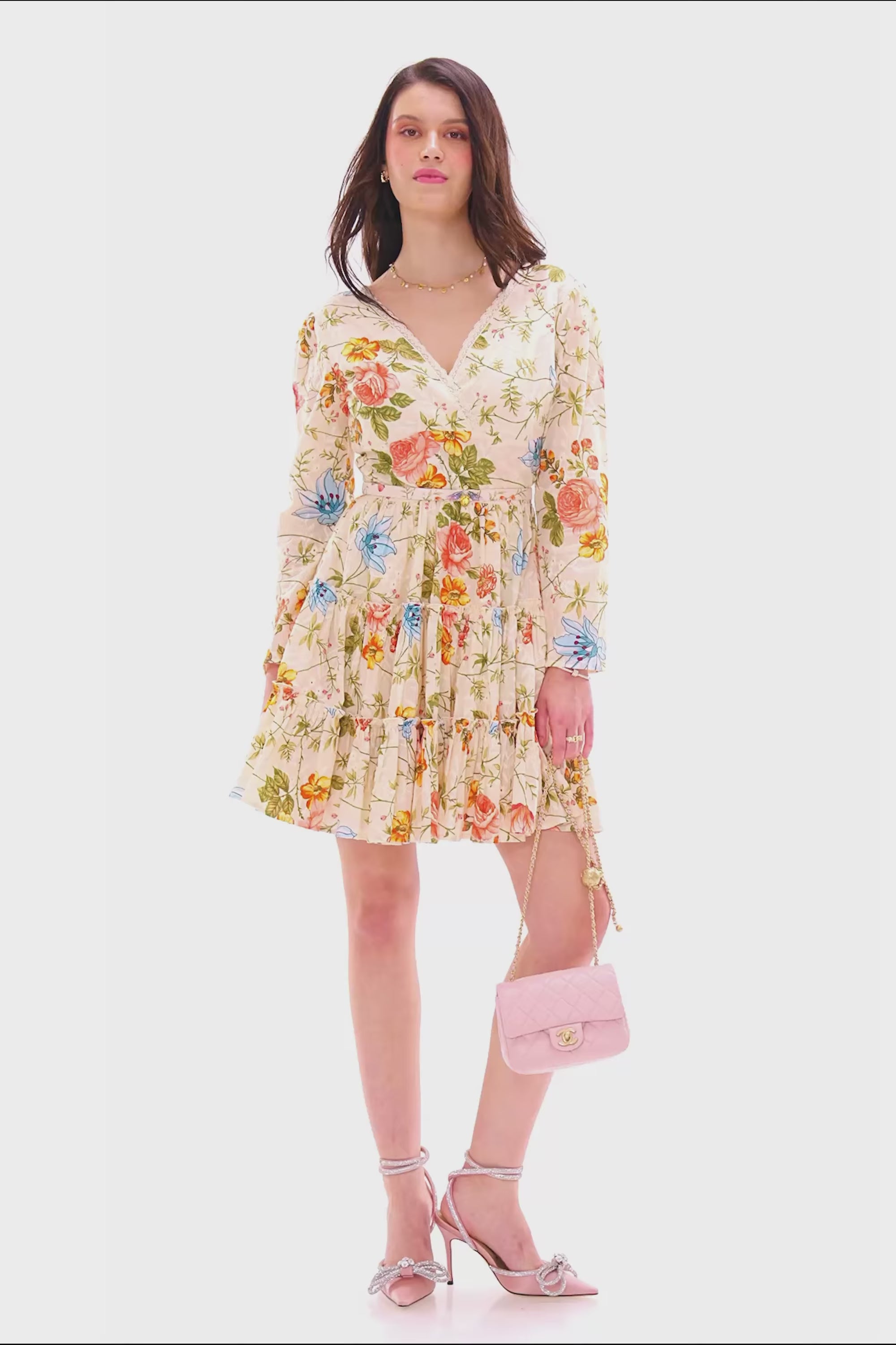 Cream floral V-neck tiered mini dress with long sleeves