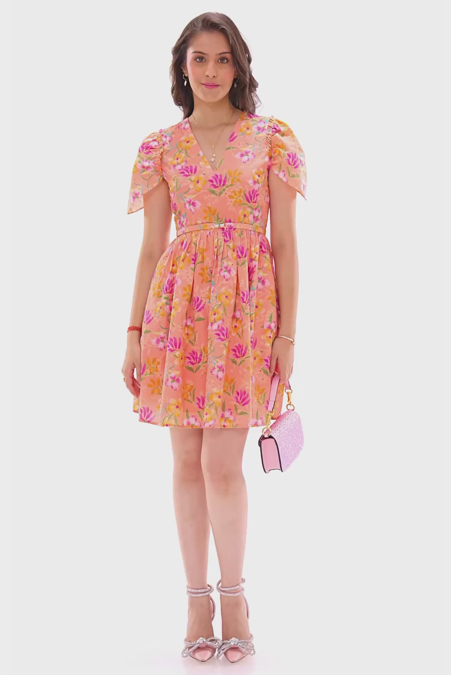 Blush floral V-neck mini dress with flutter sleeves
