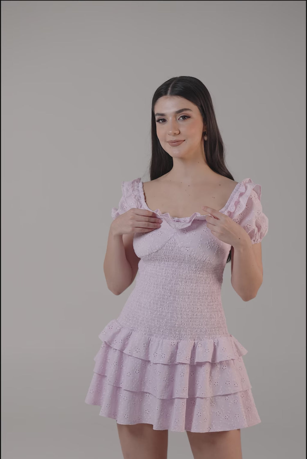 lilac puff sleeve eyelet mini dress with ruffle details and tiered hem