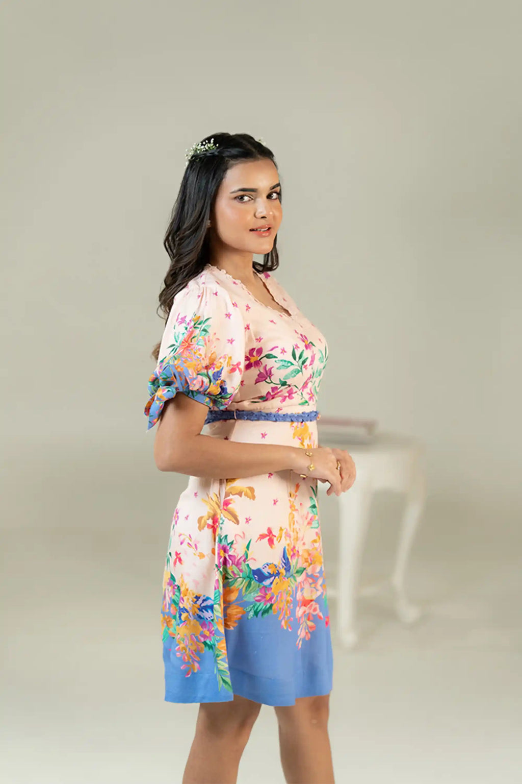 Puff sleeve floral short dress with bow tie sleeves side view