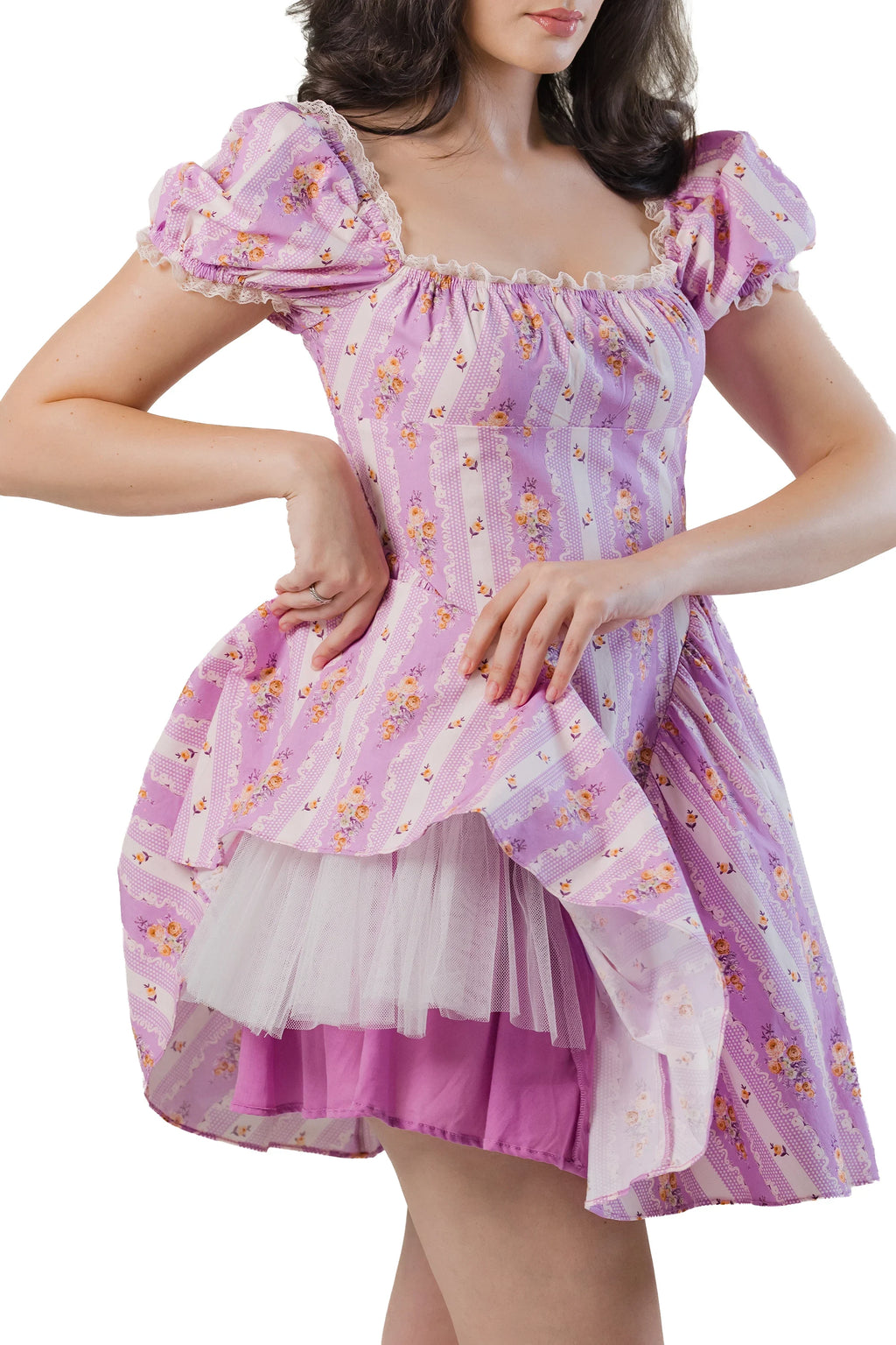 Lavender floral mini dress with puff sleeves showing layered tulle underskirt