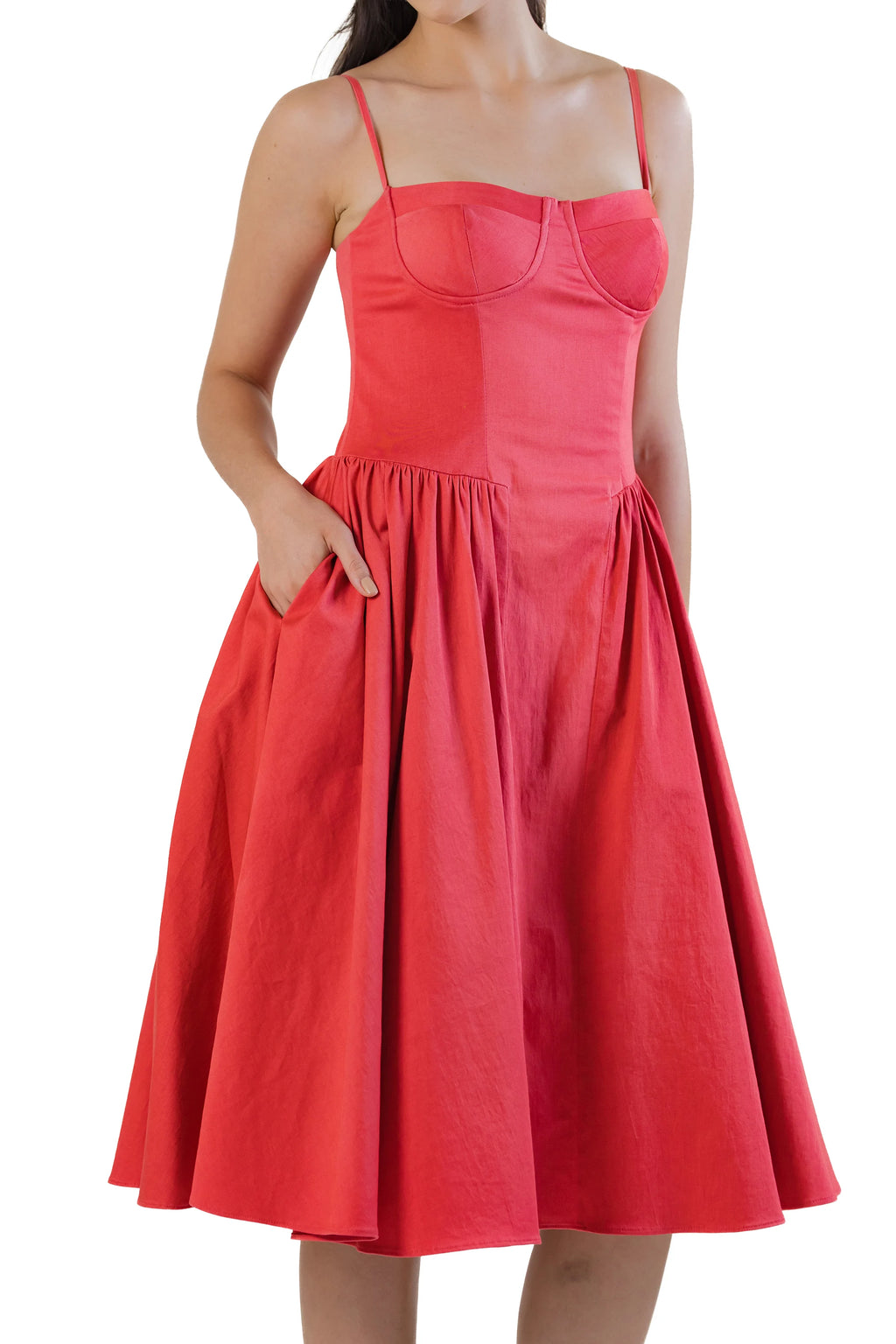Front half view of red cotton midi dress with bustier bodice, A-line fit-and-flare skirt and side pockets