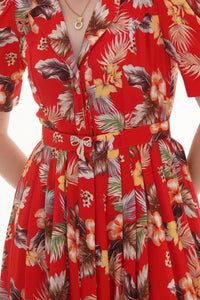 Close-up of Pretty Pixie red floral wrap ruffle long-sleeve mini dress