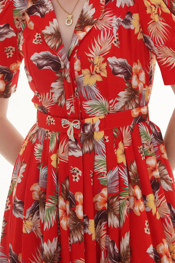 Close-up of Pretty Pixie red floral wrap ruffle long-sleeve mini dress