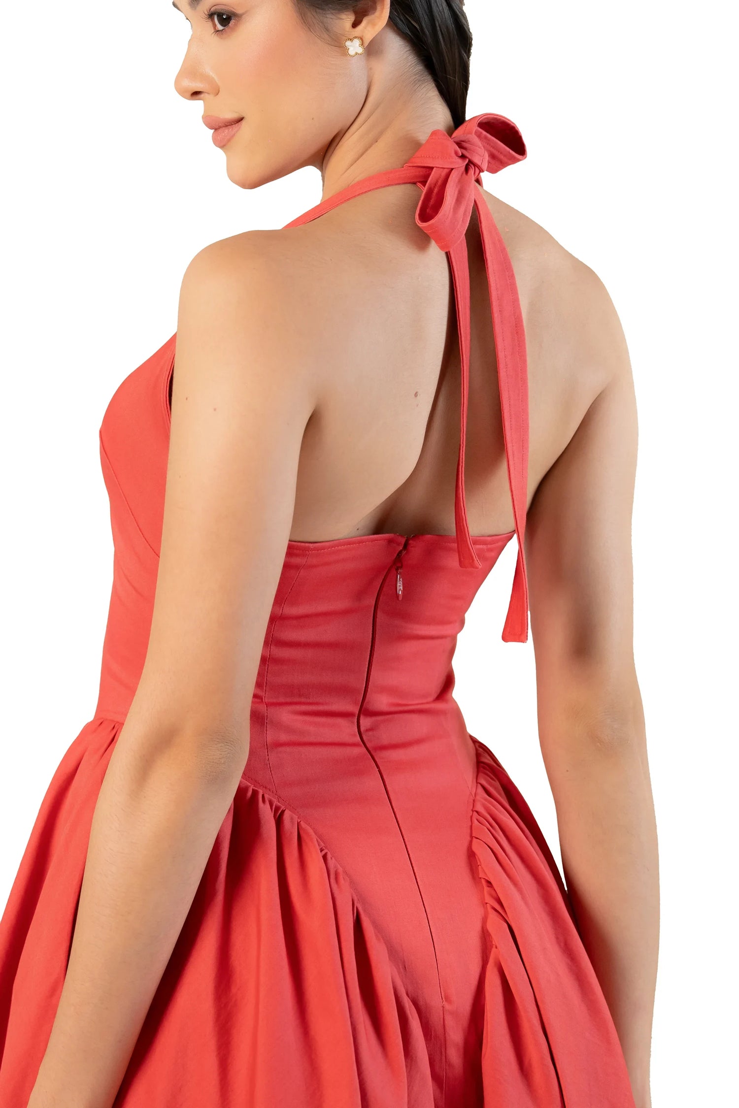 Back halter tie bow close-up on red midi dress