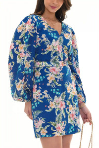 Close-up of Pretty Pixie royal indigo floral V-neck puff-sleeve belted mini dress