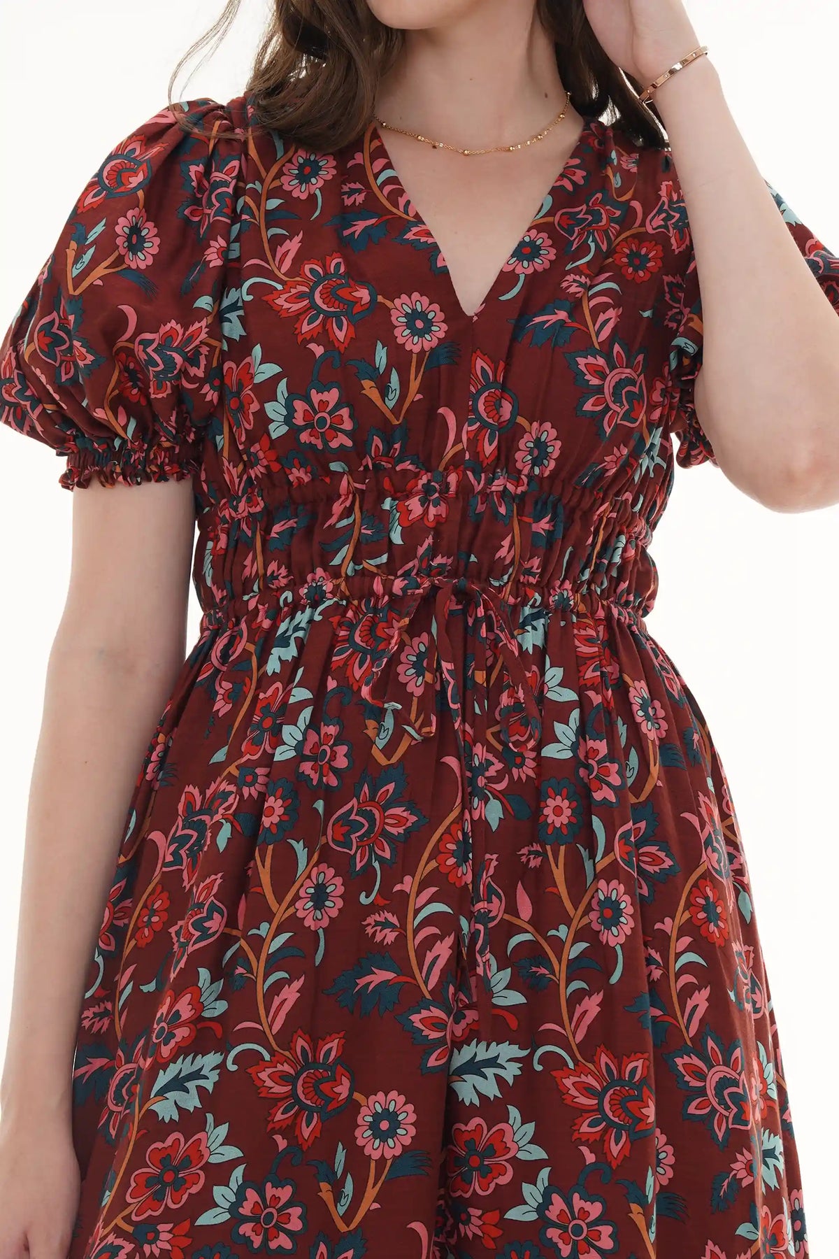 Close-up of Pretty Pixie rust floral belted shirt & flare pants co-ord set
