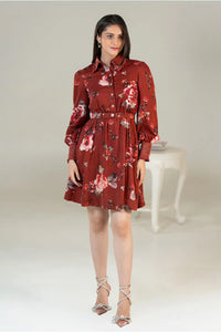 Front view of rust red floral shirt dress with waist belt