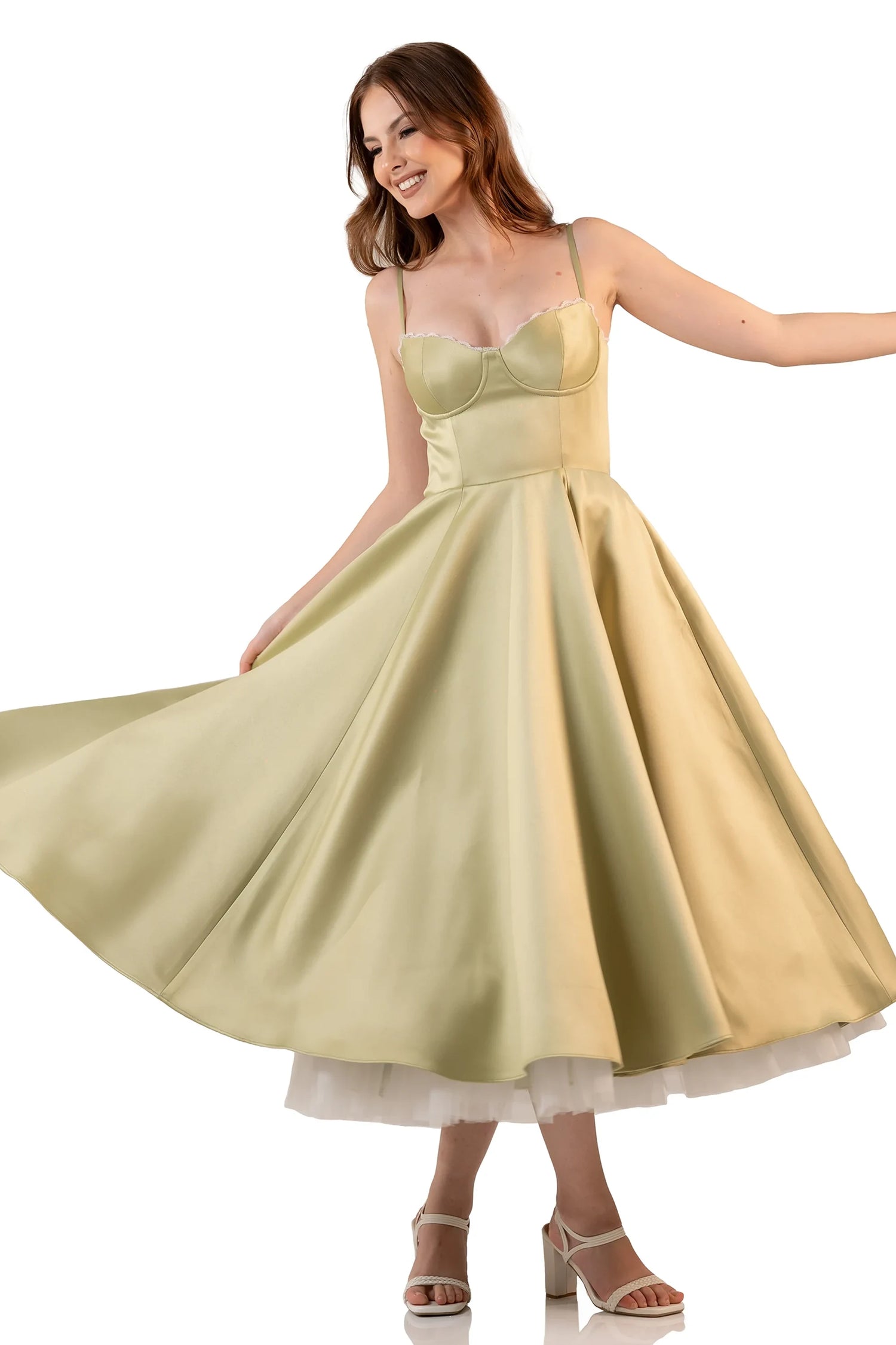 Front twirl: sage satin bustier midi dress with circle skirt