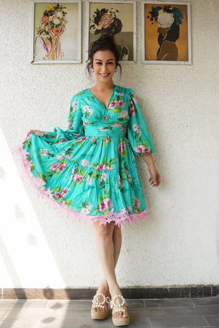 Sunayana Fozdar in Turquoise Floral V-Neck Puff-Sleeve Lace-Hem Mini Dress — oversized botanical 2026