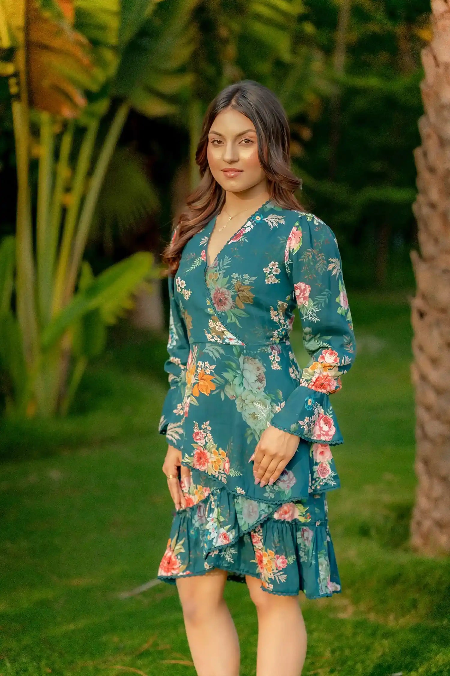 Teal floral wrap dress with ruffles side profile