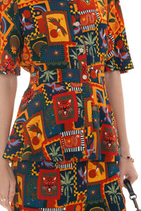 Close-up of Pretty Pixie tropical patchwork peplum co-ord set