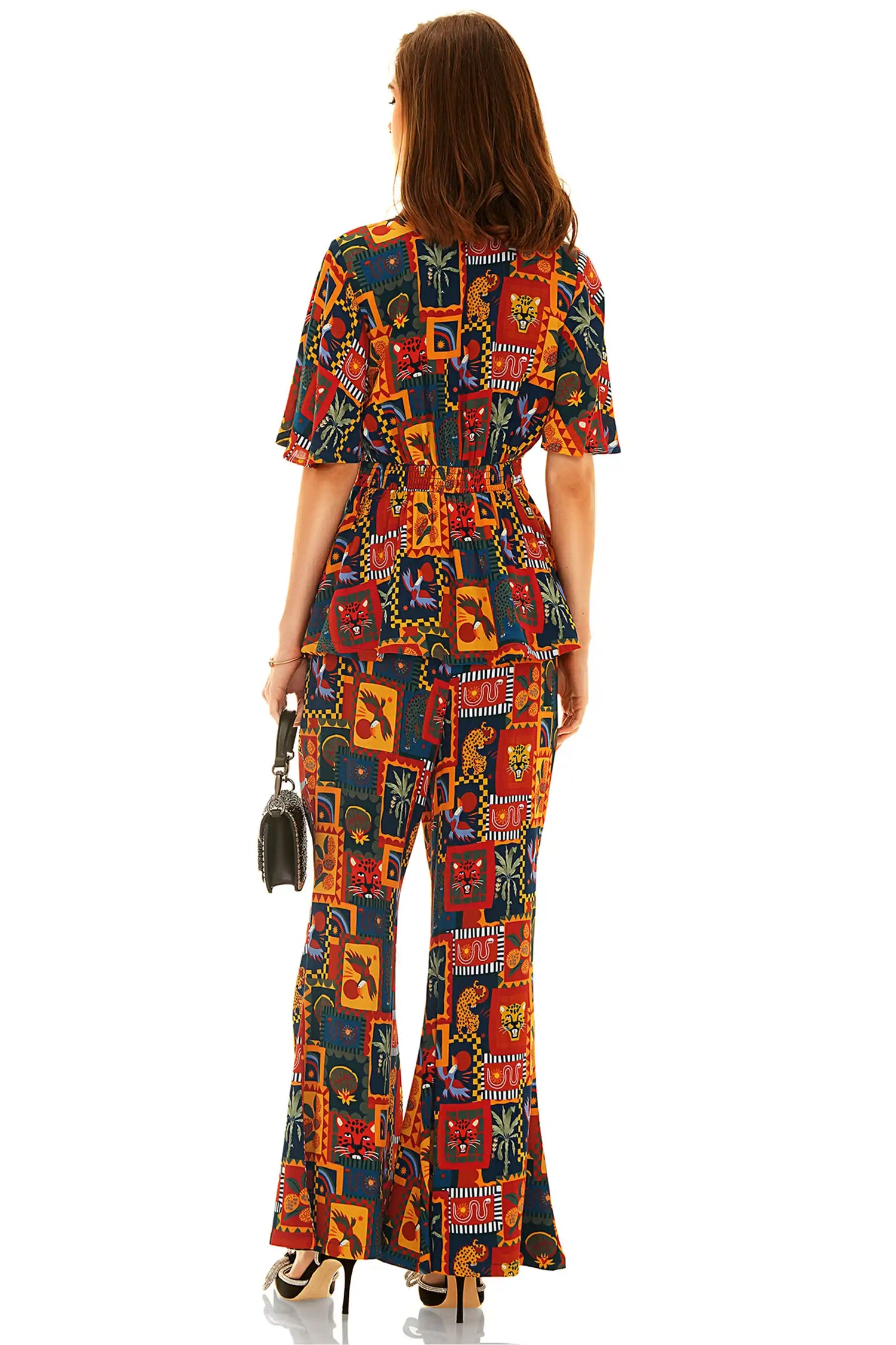Colorful tropical patchwork co-ord set with peplum top and flared pants back view