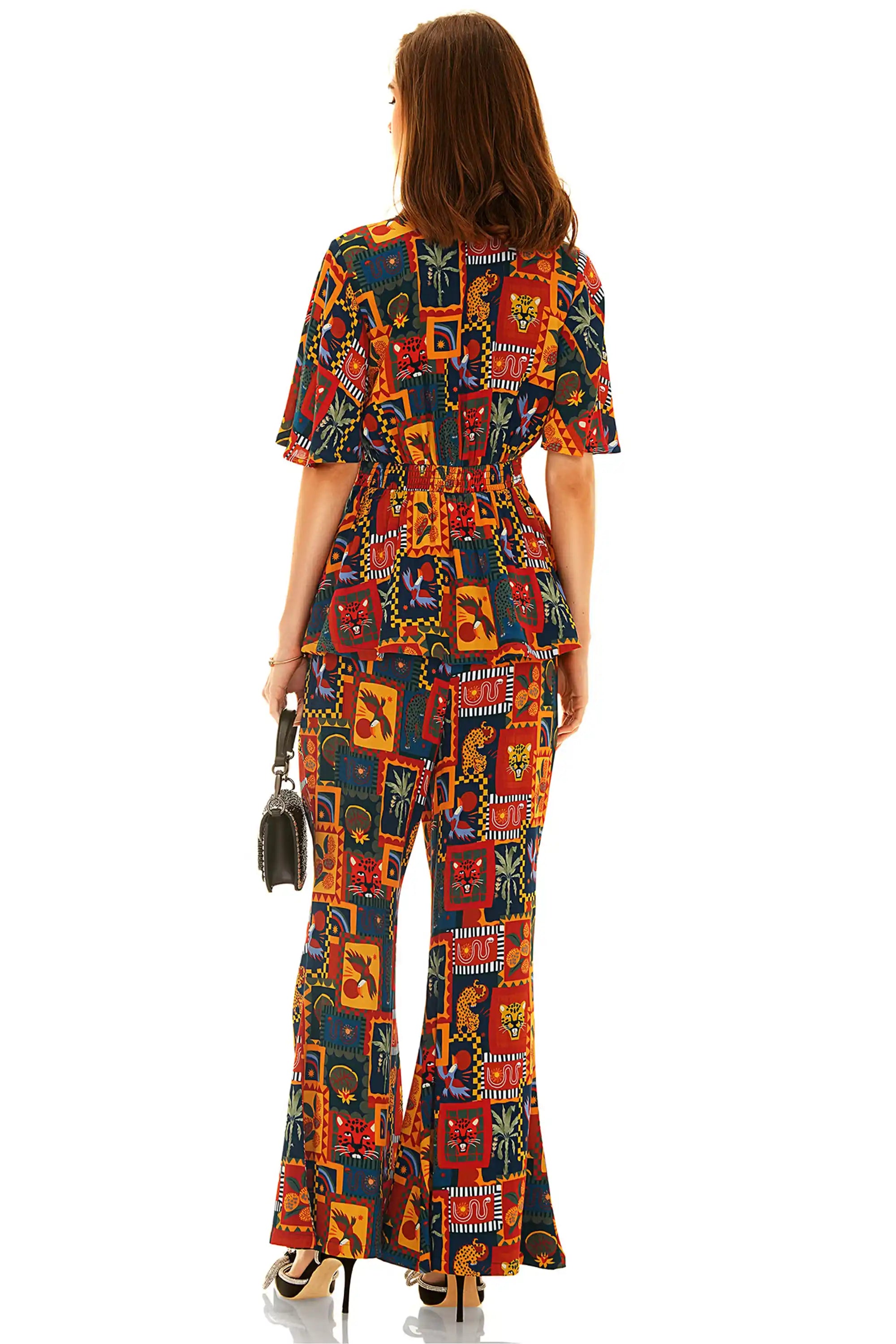 Colorful tropical patchwork co-ord set with peplum top and flared pants back view