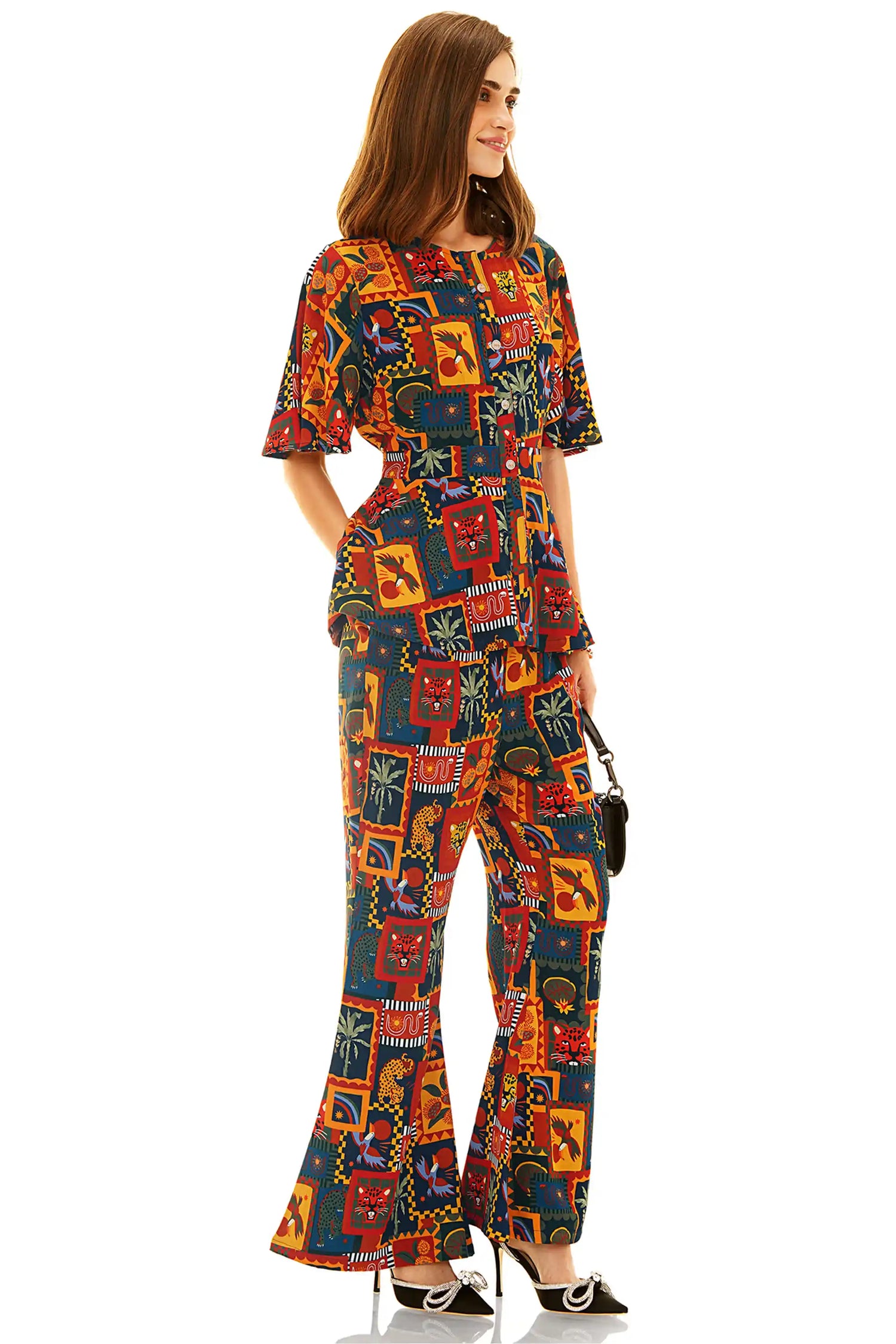 Tropical patchwork peplum co-ord set with flared pants and short sleeves side view