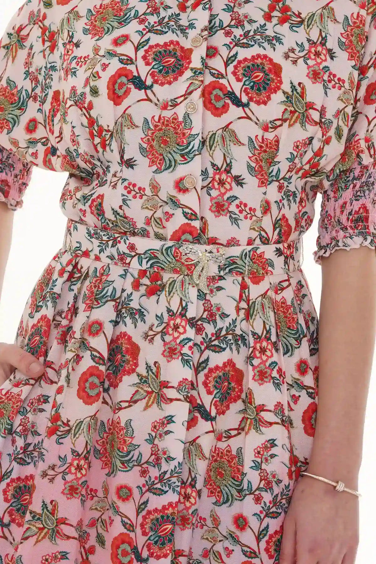 Close-up of Pretty Pixie turquoise floral lace-hem V-neck puff-sleeve mini dress