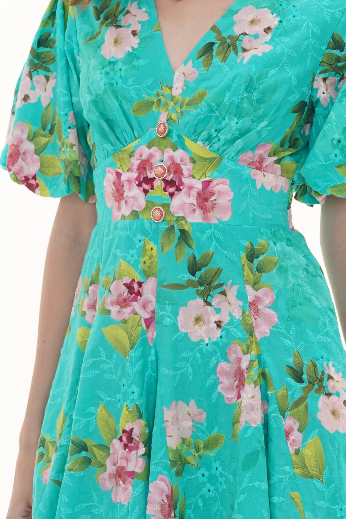 Close-up of Pretty Pixie turquoise floral lace-hem V-neck puff-sleeve mini dress, fabric detail