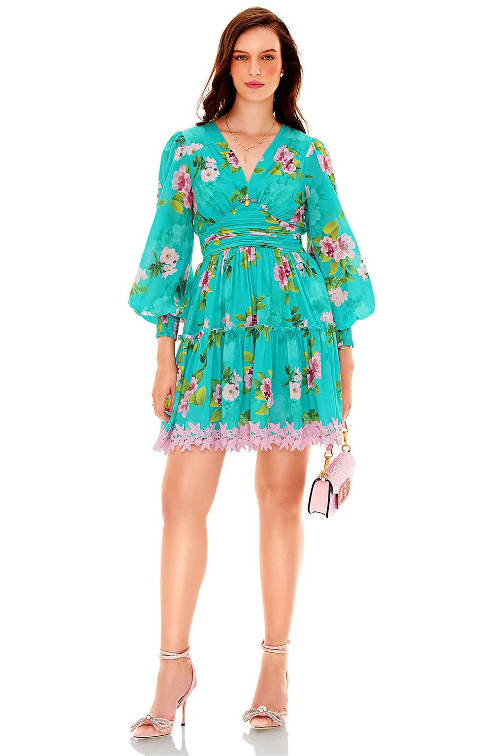 Front view of turquoise floral lace mini dress with long sleeves and lace hemline